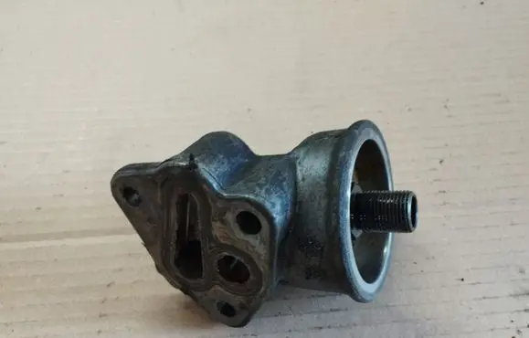 Chrysler Voyager Oil filter mounting bracket 04781165AA
