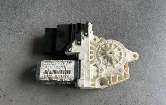 Volkswagen Touran I Rear door window regulator motor 995929106 1K0959704B