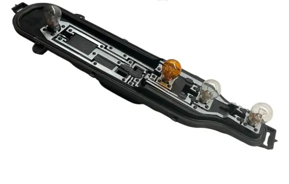 Tail light bulb cover holder