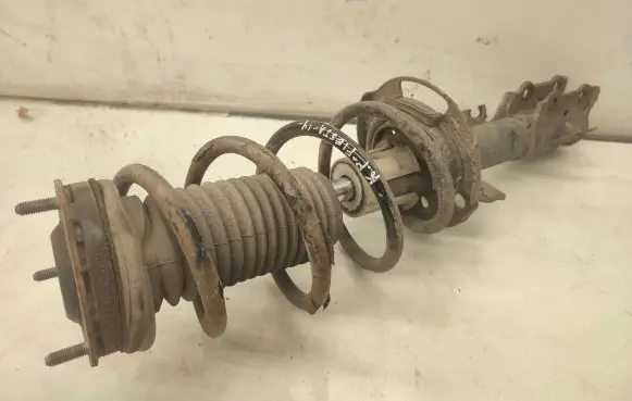 Front shock absorber with coil spring