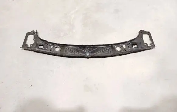 Top upper radiator support slam panel