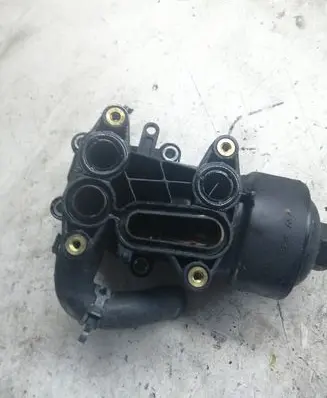 Volkswagen Golf VI Oil filter mounting bracket 03L115389C V450