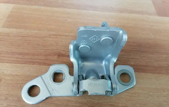 Rear door upper hinge