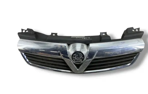 Opel Zafira B Front bumper upper radiator grill 13157590