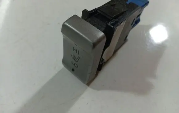 Seat heating switch