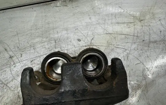 Subaru Forester SF Front brake caliper