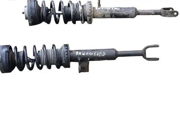 Front shock absorber with coil spring