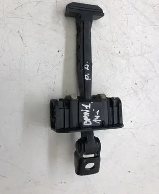 Front door check strap stopper