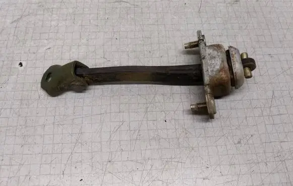 Subaru Legacy Rear door check strap stopper