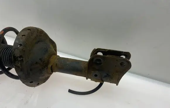 Subaru Legacy Front shock absorber with coil spring