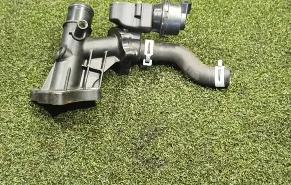 Thermostat/thermostat housing