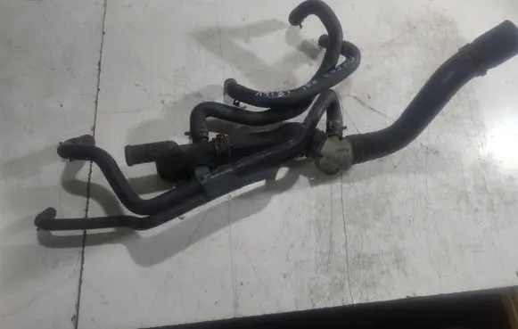 Volkswagen Caddy Engine coolant pipe/hose 06A121133J