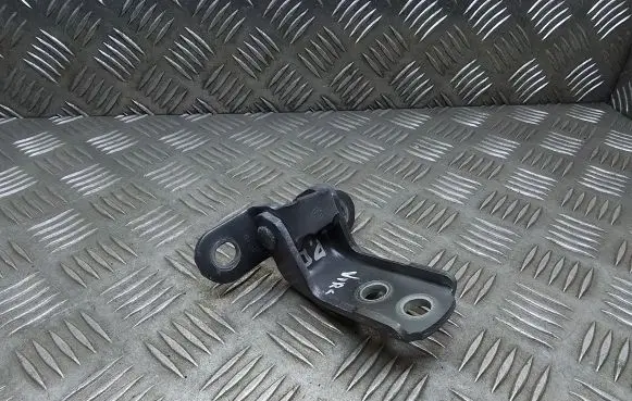 Front door check strap stopper