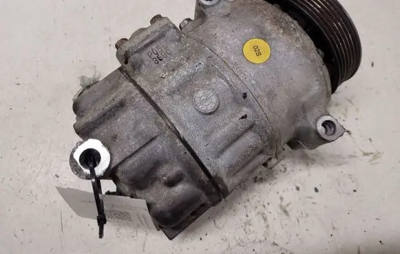 Volkswagen Golf V Air conditioning (A/C) compressor (pump) 1K0820859F 007094057B4