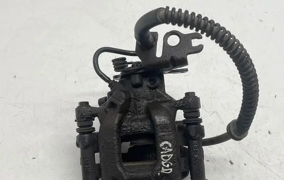 Volkswagen Caddy Rear brake caliper 