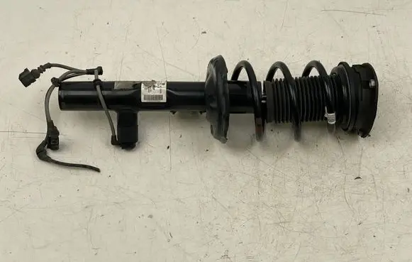Volkswagen Arteon Front shock absorber with coil spring 3Q0413032A