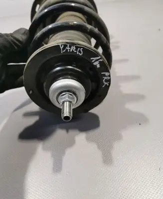 Toyota Yaris Front shock absorber with coil spring