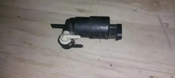 Renault Megane I Windscreen/windshield washer pump 7700821782