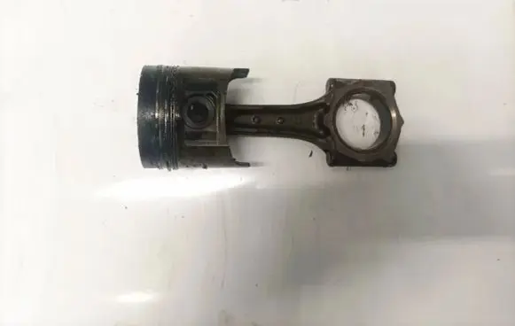 Opel Combo B Piston with connecting rod