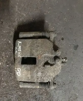 Nissan Almera N16 Front brake caliper