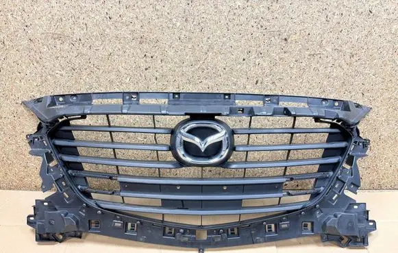 Mazda 3 II Front grill BANE50712 T25ES20