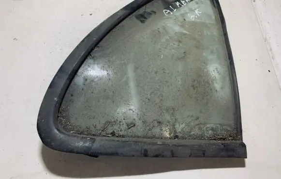 Nissan Almera Rear vent window glass 