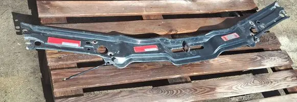Top upper radiator support slam panel