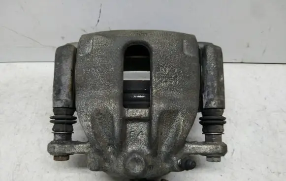 Nissan Note (E12) Front brake caliper 19507A
