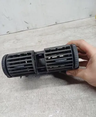 Opel Astra G Dash center air vent grill 90560344