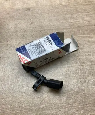 Volkswagen Touran II ABS wheel speed sensor 0986594500