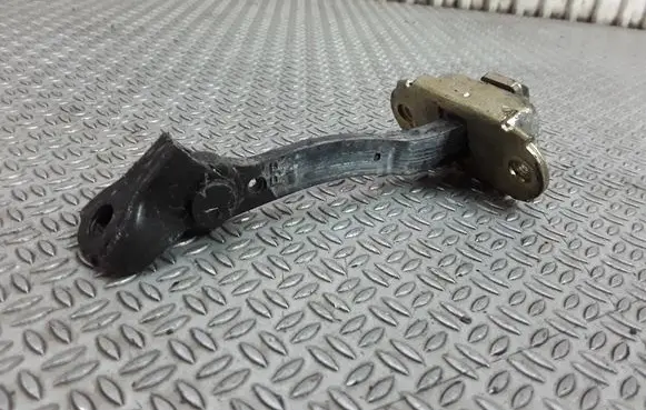 Toyota Yaris Rear door check strap stopper