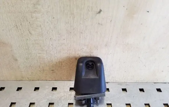Mitsubishi Pajero Sport I Headlight washer spray nozzle