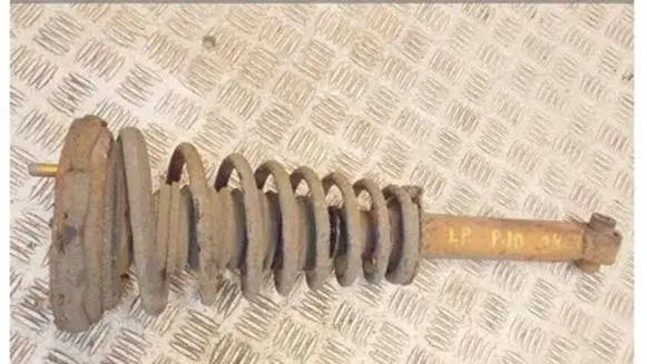 Nissan Primera Front shock absorber with coil spring
