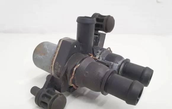 Coolant heater control valve
