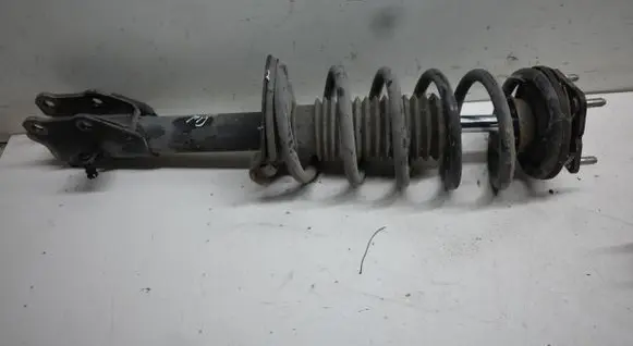 Mazda CX-7 Front shock absorber with coil spring EH6434700A