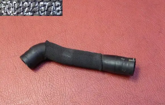 Volkswagen Golf VII Engine coolant pipe/hose 5Q0122157AB