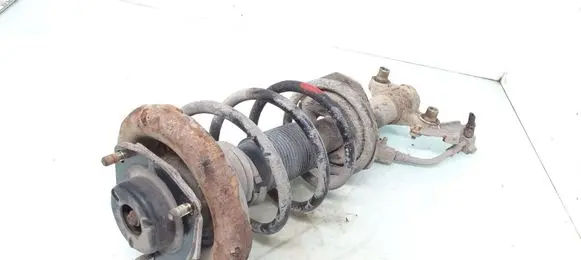 Nissan Primera Front shock absorber with coil spring