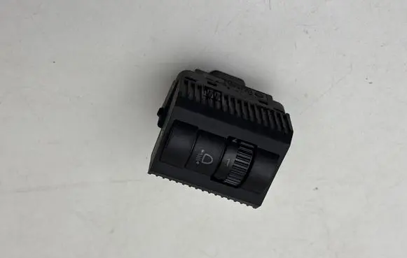 Headlight level height control switch