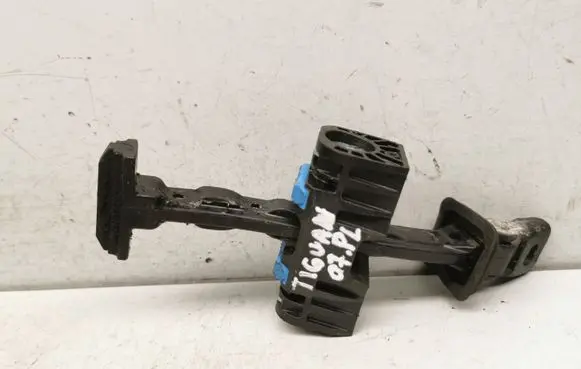 Volkswagen Tiguan Front door check strap stopper 5N0837249A