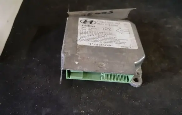 Hyundai Coupe Airbag control unit/module 9591026200