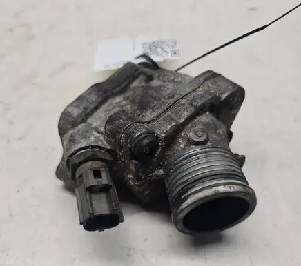 Thermostat/thermostat housing