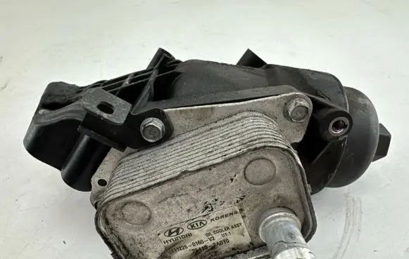 KIA Rio Oil filter mounting bracket 264102A010