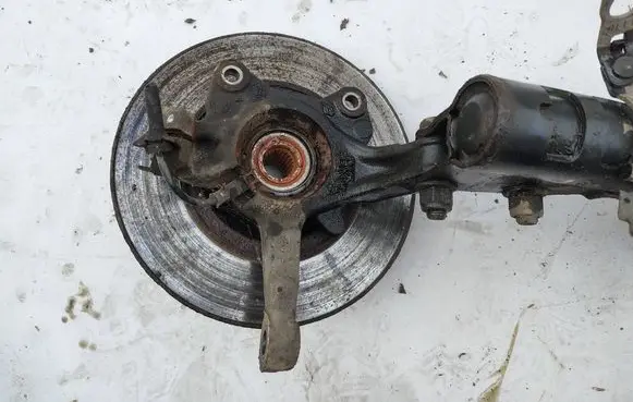Front wheel hub spindle knuckle