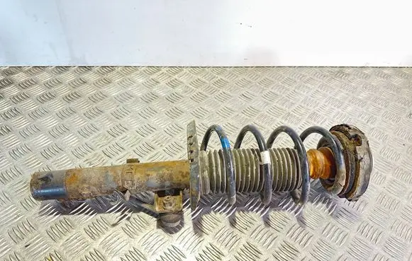 Volkswagen Fox Front shock absorber with coil spring