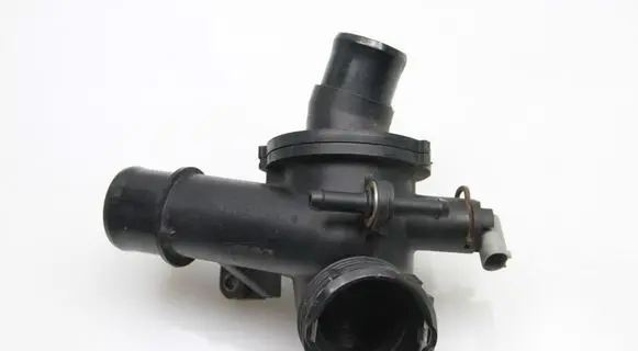 Thermostat/thermostat housing