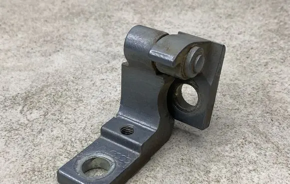 Rear door upper hinge