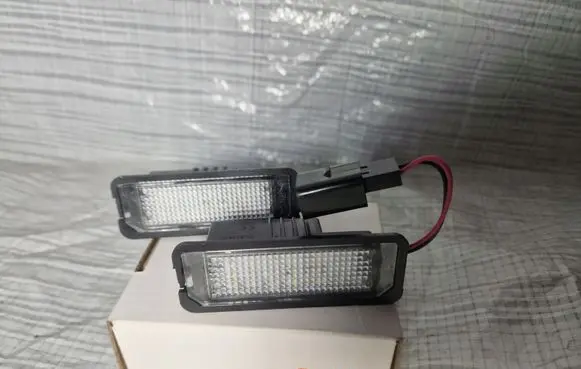 Volkswagen Golf V Number plate light DDCA04979