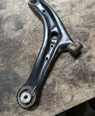 Ford Courier Front lower control arm/wishbone 
