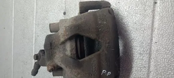 Volkswagen Golf III Front brake caliper