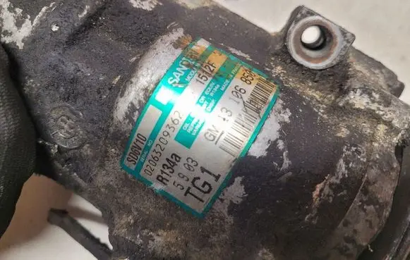 Opel Corsa C Air conditioning (A/C) compressor (pump) 13106850 02063209362